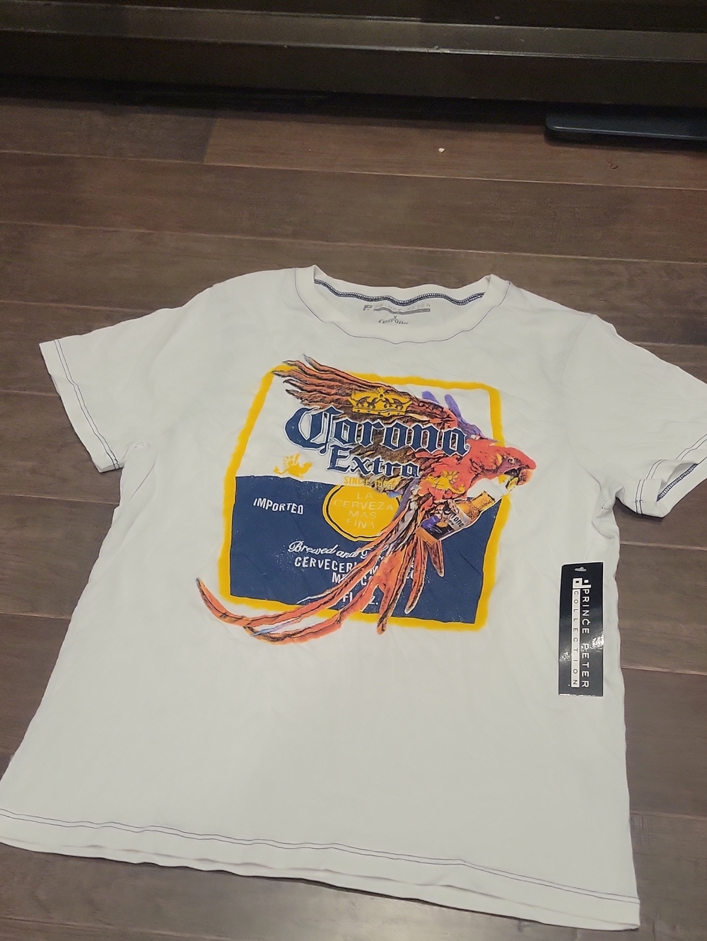 Corona White T‑Shirt with Blue Stitching and Multicolor Graphic